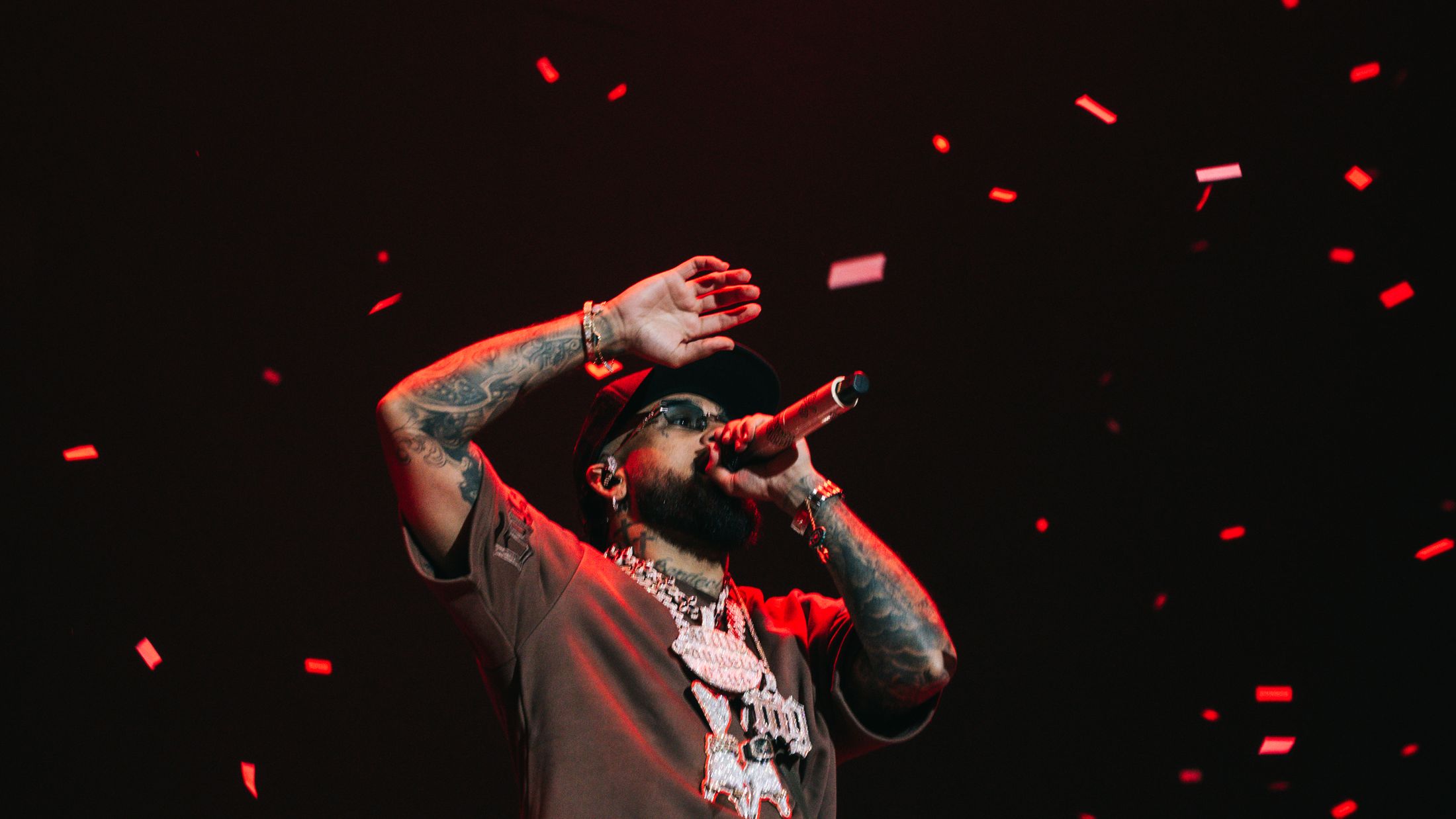 Bryant Myers under red confetti