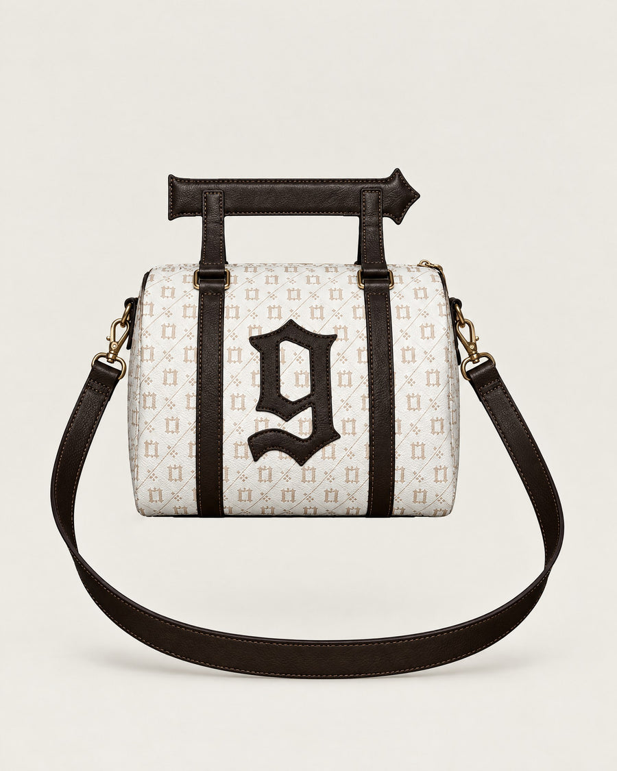 One Percent Cross Body Purse (Creme and Brown), de frente, con la «g» en piel negra y la correa
