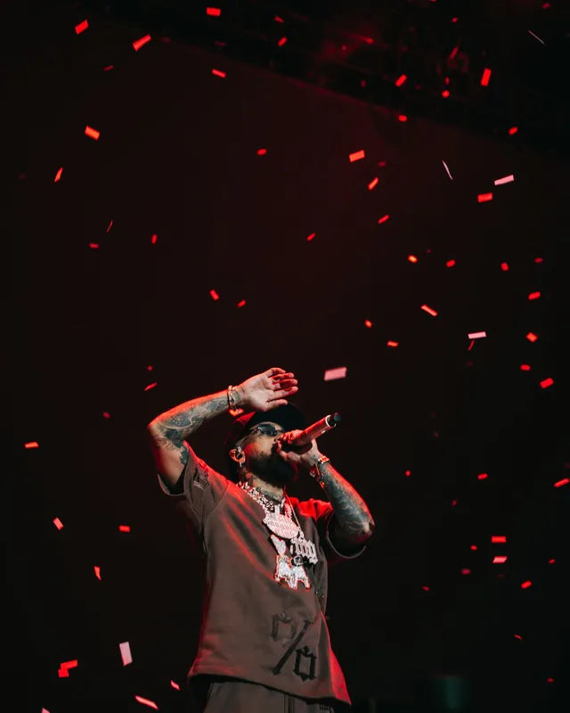 Bryant Myers under red confetti